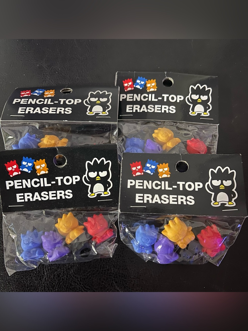 Vintage Badtz-maru pencil-top erasers from the Sanrio brand.
